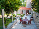 Outside dining area in park of this exclusive Dubrovnik villa