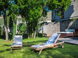 Sunbeds in garden of the five star villa in Dubrovnithe k