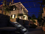 Night view on the villa from lower outside terrace