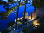 Outside of the waterfront luxury villa in Dubrovnik Croatia by night