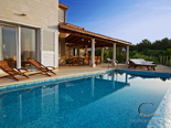 Swiming pool from the other side in beachfront holiday luxury villa on island Brac Dalmatia Croatia