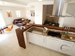 Kitchen and living room in five star holiday villa on island Brac in Dalmatia in Croatia