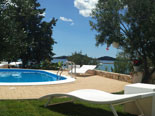 Sun beds on the pool in luxury villa in Dalmatia in Croatia