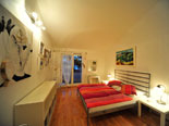 Second double bedroom in Hvar villa for rent on the first floor with terrace and breathtaking sea views