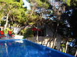 Pool area in Hvar vacation villa with sun leisure amenities  