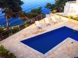 The pool of the modern Dalmatian seafront villa with pool on Brac Island in Split region