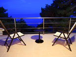 Outside terrace in the modern Dalmatian seafront villa with pool on Brac Island in Split region