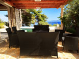 Outside terrace in the modern Dalmatian seafront villa with pool on Brac Island in Split region