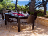 Outside dining terrace in front of the Dalmatian villa with pool on Brac Island in Split region