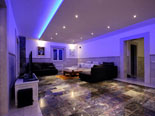 Nighttime lighting in the living room which is located on the second floor of this luxury villa on Korčula island