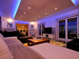 Night living room photo of the holiday villa on Korcula island taken from the another ange 