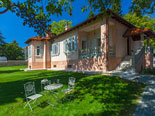 This vintage villa has large garden enclosed by a wall