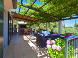 Terrace in front of the villa for enjoying the scents of the sea, pine trees and Mediterranean plants.