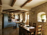 Dining room and kitchen in Dalmatian holiday villa in Milna on Brac island in Croatia