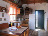 Another view on dining room and kitchen in this traditional style Brač house