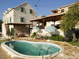 Pool of the old dalmatian stone villa in Sumartin on Island of Brač Croatia