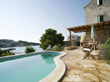 View from the pool of the old Dalmatian stone villa in Sumartin on Island of Brač Croatia