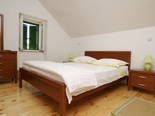 Bedroom in the old Dalmatian stone villa in Sumartin on Island of Brač Croatia