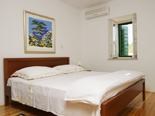 Bedroom in the old Dalmatian stone villa in Sumartin on Island of Brač Croatia