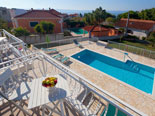 View from terrace on pool area in Dalmatian stone holiday rental villa in Sumartin on Brač Island 