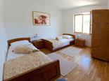 Bedroom in Dalmatian holiday villa with pool for rent in Sumartin on Brač Island 