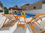 Leisure area at the pool of the four star holiday villa for rent in Povlja on Brač Island in Dalmatia