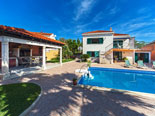 Pool and summer dining house in rental villa in Sumartin on Brač Island in Dalmatia in Croatia