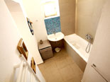 En-suite bathroom of the downstairs double room with exterior entrance in Hvar holiday house