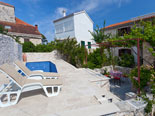 Pool area in front of villa in Sutivan on Brač island