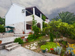 Colorful holiday villa with swimming pool in Sutivan on Brač Island in Dalmatia