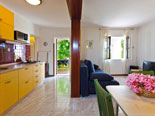 Kitchen and living room on the ground floor in the Sutivan holiday house