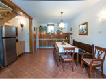 Dining room and kitchen in this old and renovated vacation villa for rent in Dubrovnik