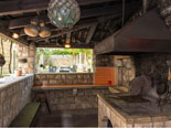 In west side of the courtyard there is covered BBQ kitchen with fireplace