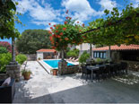 View on the pool area from the courtyard of this Dubrovnik holiday villa