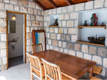 Cottage on the pool of this Dubrovnik villa with the table and toilet 