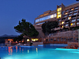 View on the five stars Hotel Dubrovnik Palace from the outdoor pool by night