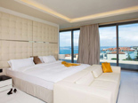 White Presidential suite bedroom at the five stars Kempinski Hotel Adriatic Istria Croatia