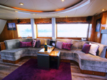 Lavish lounge on the Elegance 82, a luxury yacht for charter in Croatia.