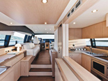 Kitchen and saloon on Ferretti 620 a luxury yacht for charter in Dubrovnik and Croatia